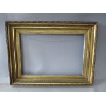 A 19TH CENTURY GOLD FRAME, with reeded inner and acanthus leaf design to outer edge, with gold slip,