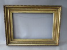 A 19TH CENTURY GOLD FRAME, with reeded inner and acanthus leaf design to outer edge, with gold slip,