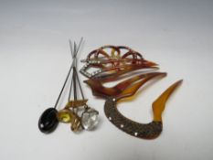 A COLLECTION OF VINTAGE HAIR ACCESSORIES, comprising five assorted hat pins, including a 15ct gold