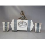 AN ART DECO CLOCK GARNITURE, showing a female dancer on variegated marble case, the eight day French