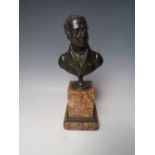 A 19TH CENTURY BRONZE BUST ON MARBLE PEDESTAL, depicting a classical gentleman, H 24.5 cm