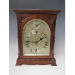 A MAHOGANY CASED J.J. ELLIOTT WESTMINSTER CHIME MANTLE CLOCK, retailed by E.H. Lawley & Sons Ltd.,