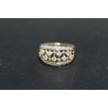 A HALLMARKED 14 CARAT GOLD PIERCED GALLERY DIAMOND RING, approximate weight 5.1 g, ring size S