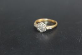 AN 18CT & PLAT DIAMOND CLUSTER 'FLOWER' RING, approx weight 2.3g, ring size O