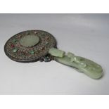 A CHINESE SILVER AND ENAMEL HAND MIRROR MOUNTED WITH JADE, the handle made from a carved jade belt