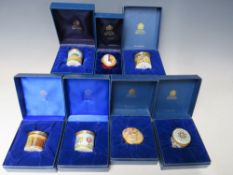 A COLLECTION OF SEVEN HALCYON DAYS ENAMEL PILL BOXES, comprising 'Princess Royal' steam train for