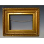 A 19TH CENTURY GOLD FRAME, with egg and dart design to inner edge and acanthus leaf design to