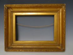 A 19TH CENTURY GOLD FRAME, with egg and dart design to inner edge and acanthus leaf design to