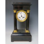 A FRENCH EBONISED PORTICO CLOCK, the architectural case with four pillars having decorative gilt