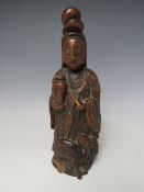 A 19TH CENTURY BAMBOO FIGURE DEPICTING GUANGIN, H 24.5 cm