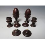 A COLLECTION OF VARIOUS ITEMS OF TREEN, to include small lidded urns and two eggs