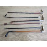 A COLLECTION OF SIX EQUESTRIAN THEMED RIDING CROPS TO INCLUDE A SILVER COLLARED EXAMPLE