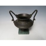 A LATE 19TH CENTURY BRONZED TWIN HANDLED URN. raised on a square marble base, overall H 16 cm