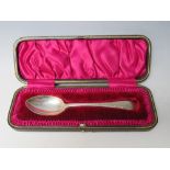 A CASED HALLMARKED SILVER SPOON - SHEFFIELD 1909, makers mark for J.R, probably John Round and Son