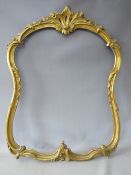 A LATE 19TH CENTURY GOLD CARVED WOODEN DECORATIVE ROCOCO FRAME, frame W 4.5 cm, rebate 79 x 66 (