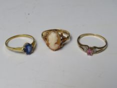 THREE 9CT GOLD LADIES DRESS RINGS, comprising a cameo ring size R, a tanzanite ring size T and a