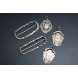 THREE SILVER WATCH FOBS AND TWO BUCKLES, (5)