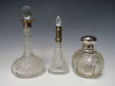 A CHESTER HALLMARKED SILVER TOPPED GLOBULAR SCENT BOTTLE, with cut detail to glass body, together