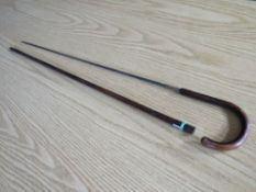 A LATE 19TH CENTURY PALMWOOD SWORD STICK, L 89 cm