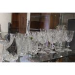 A COLLECTION OF WATERFORD CRYSTAL GLASSWARE TO INCLUDE A DECANTER AND TWENTY FOUR GLASSES,