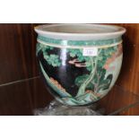 A ORIENTAL JARDINIERE / PLANTER WITH TYPICAL DECORATION