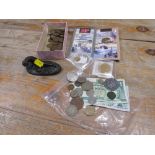 A TRAY OF ASSORTED BANK NOTES AND COINAGE TOGETHER WITH A SMALL BRONZED FIGURE