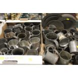 TWO TRAYS OF ASSORTED PEWTER TANKARDS, PLATES ETC, SOME WITH TOUCH MARKS