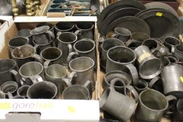 TWO TRAYS OF ASSORTED PEWTER TANKARDS, PLATES ETC, SOME WITH TOUCH MARKS