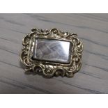 AN ANTIQUE 19TH CENTURY MOURNING BROOCH