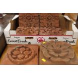 A SELECTION OF SIX ASSORTED VINTAGE TERRACOTTA PATTERNED TILES