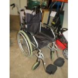 A CARE CO FOLDABLE WHEELCHAIR