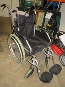 A CARE CO FOLDABLE WHEELCHAIR