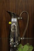 A CULINARY CONCEPTS OF LONDON STAINLESS WATER JUG WITH LEATHER HANDLE