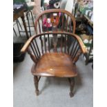 A TRADITIONAL ANTIQUE ELM WINDSOR ARMCHAIR