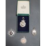 FOUR HALLMARKED SILVER FOBS