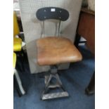 A MODERN TAN LEATHER AND METAL INDUSTRIAL STYLE STOOL