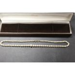 A PEARL NECKLACE WITH 9CT GOLD CLASP