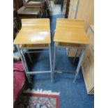 A SET OF FOUR RETRO STYLE STACKING STOOLS (4)