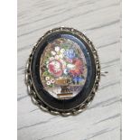 AN ANTIQUE SILVER MICRO MOSAIC BROOCH