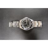 A MENS STAINLESS STEEL DIVERS WATCH BY GROVANNA WITH SWISS RONDA JEWELLED MOVEMENT