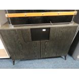 A MODERN BLACK ASH STYLE TWO DOOR CABINET H-73 W-100 CM