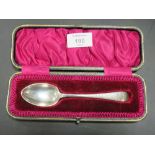A CASED HALLMARKED SILVER SPOON - SHEFFIELD 1909, makers mark for J.R, probably John Round and Son