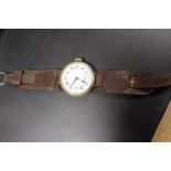 A LARGE OVER SIZED TRENCH ANTIQUE WRIST WATCH