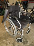 A CARE CO FOLDABLE WHEELCHAIR