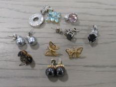 A COLLECTION OF ASSORTED EARRINGS TOGETHER WITH A GEMSET SILVER PENDANT