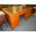 A 20TH CENTURY YEW LEATHER TOPPED TWIN PEDESTAL DESK H-77 W-152 D-90 CM