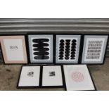 A COLLECTION OF SEVEN BLACK FRAMED MODERN PRINTS