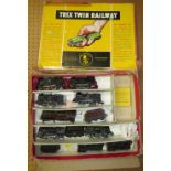 A SELECTION OF TRIX TWIN RAILWAY LOCOMOTIVES AND TENDER, contained in a Trix box