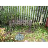 TWO LARGE WROUGHT IRON PLANT STANDS, PARASOL BASE, BIRD FEEDER AND TWO OBELISKS (6)