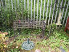 TWO LARGE WROUGHT IRON PLANT STANDS, PARASOL BASE, BIRD FEEDER AND TWO OBELISKS (6)
